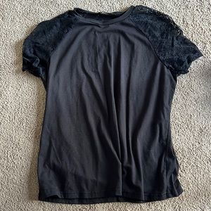 Black short sleeved shirt with lace short sleeves.